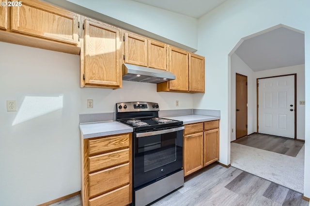 21122 NW Cannes Dr, Portland, OR 97229 - kitchen featuring stainless steel electric range oven, under cabinet range hood, light wood-style flooring, and light countertops