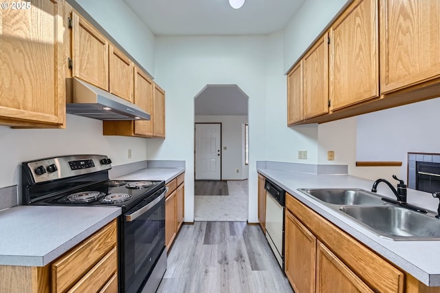 21122 NW Cannes Dr, Portland, OR 97229 - kitchen featuring stainless steel electric stove, under cabinet range hood, white dishwasher, light wood-style flooring, and light countertops