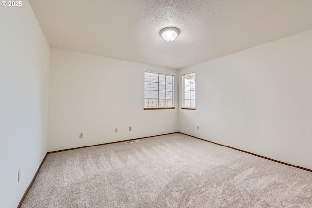 21122 NW Cannes Dr, Portland, OR 97229 - empty room with carpet and a textured ceiling
