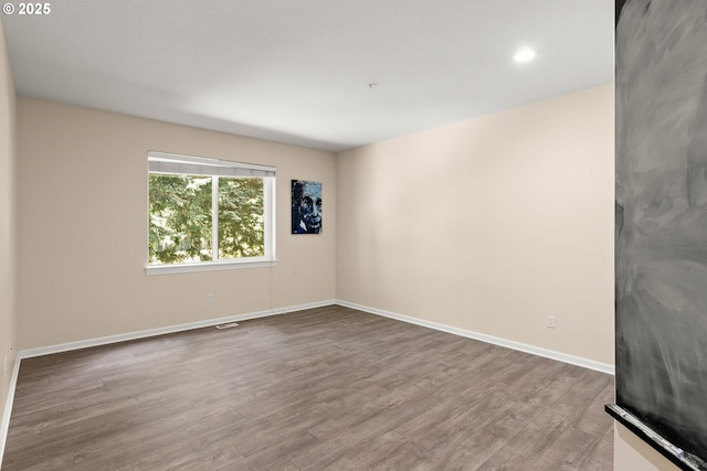 15110 Oyer Dr, Oregon City, OR 97045 - spare room featuring wood finished floors and recessed lighting
