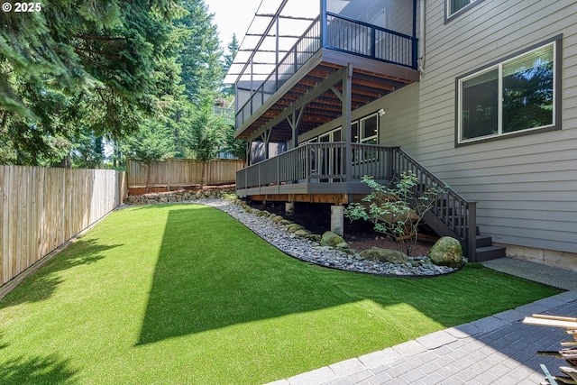 15110 Oyer Dr, Oregon City, OR 97045 - fenced backyard with a deck, a balcony, and stairs