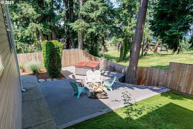 15110 Oyer Dr, Oregon City, OR 97045 - fenced backyard with a hot tub and a patio