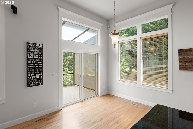 15110 Oyer Dr, Oregon City, OR 97045 - unfurnished dining area featuring wood finished floors and baseboards