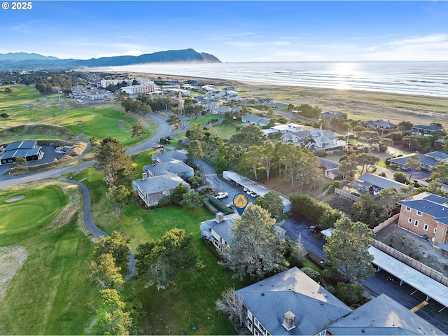 birds eye view of property featuring a water and mountain view