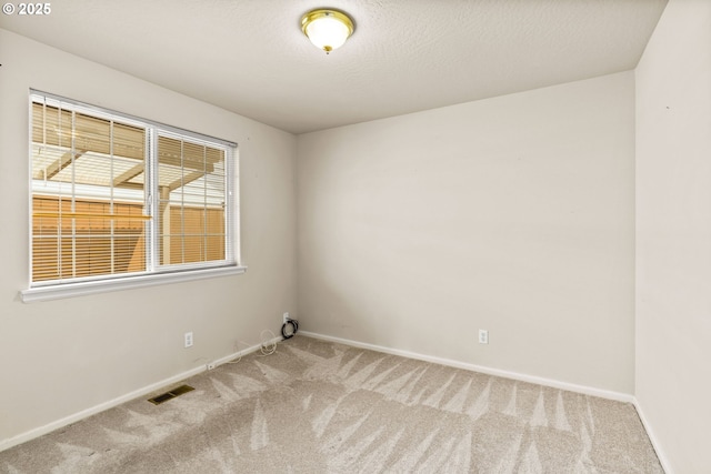 2494 Cubit St, Eugene, OR 97402 - empty room with carpet flooring and baseboards