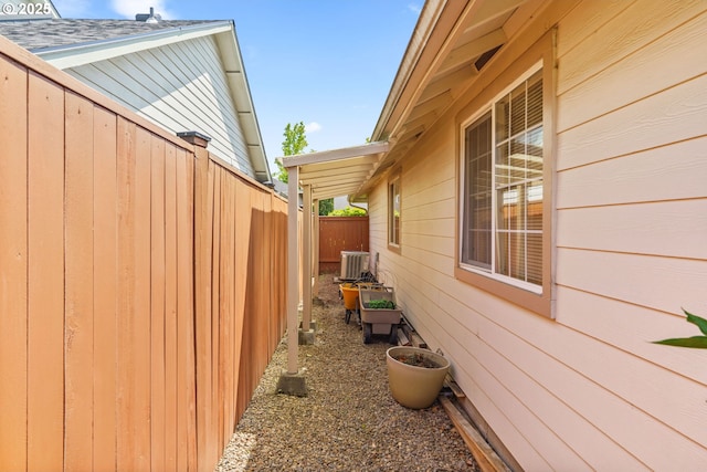 2494 Cubit St, Eugene, OR 97402 - view of side of home featuring central AC unit