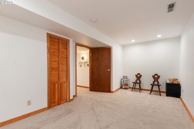 interior space with baseboards, carpet flooring, recessed lighting, and visible vents