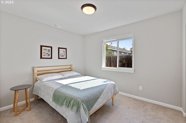 902 SE 3rd St, Prineville, OR 97754 - carpeted bedroom featuring visible vents and baseboards