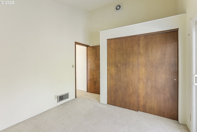 26400 NW St Helens Rd Unit 57, Scappoose, OR 97056 - unfurnished bedroom featuring carpet floors and a closet