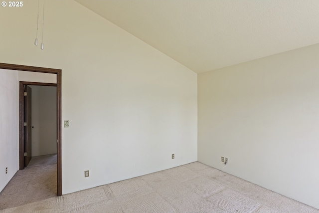 26400 NW St Helens Rd Unit 57, Scappoose, OR 97056 - carpeted spare room with lofted ceiling