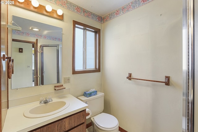 26400 NW St Helens Rd Unit 57, Scappoose, OR 97056 - bathroom featuring toilet and vanity