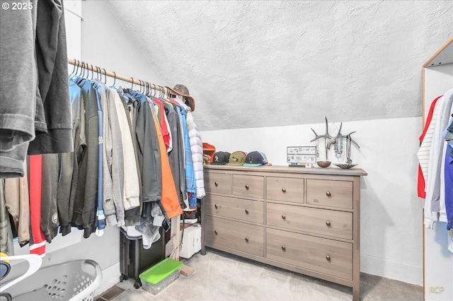 8014 N Johnswood Dr, Portland, OR 97203 - spacious closet with lofted ceiling and light carpet