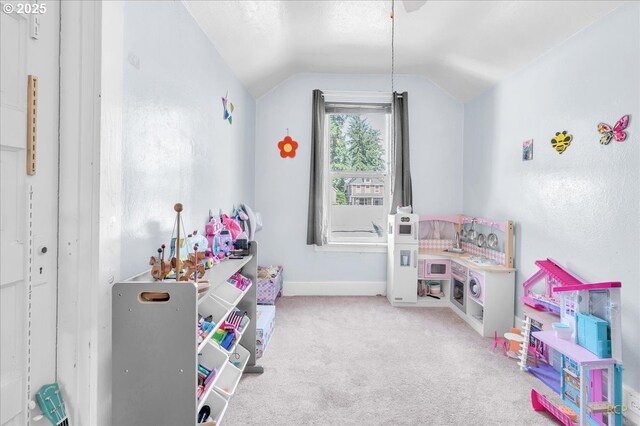 8014 N Johnswood Dr, Portland, OR 97203 - rec room featuring vaulted ceiling, carpet flooring, and baseboards