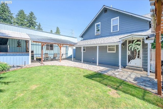 8014 N Johnswood Dr, Portland, OR 97203 - back of house featuring a patio area and roof with shingles