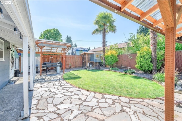 8014 N Johnswood Dr, Portland, OR 97203 - view of yard featuring a patio area, a pergola, and an outdoor structure