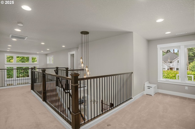 4720 Firwood Rd, Lake Oswego, OR 97035 - hall featuring carpet, a textured ceiling, an upstairs landing, and recessed lighting