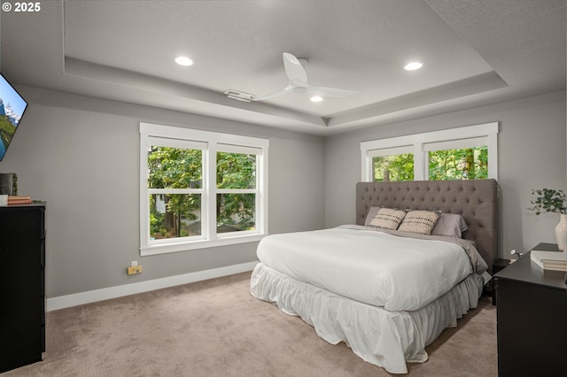 4720 Firwood Rd, Lake Oswego, OR 97035 - carpeted bedroom featuring a tray ceiling, recessed lighting, and a ceiling fan
