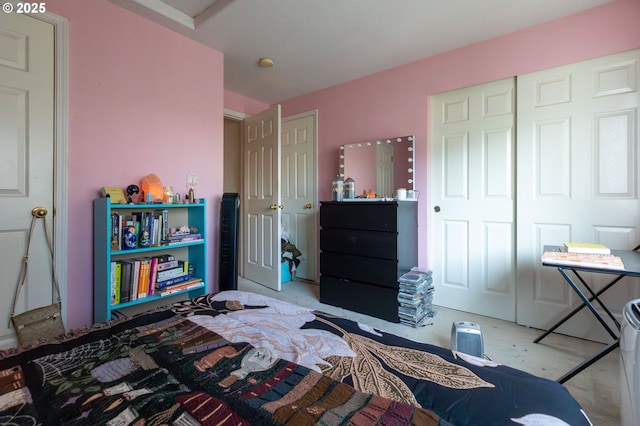 bedroom featuring light tile patterned flooring and a closet