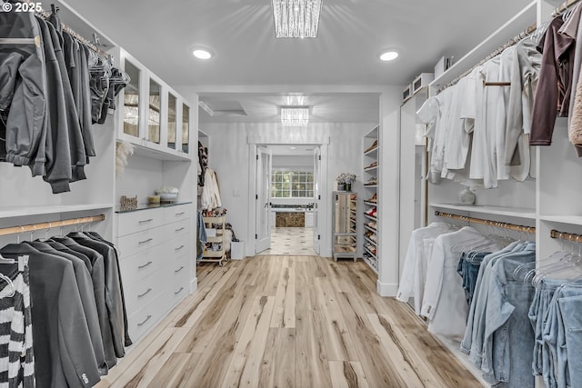 2646 N Lambert St, Cornelius, OR 97113 - walk in closet featuring a chandelier and light wood finished floors