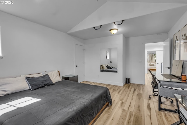 2646 N Lambert St, Cornelius, OR 97113 - bedroom with light wood-style flooring and vaulted ceiling