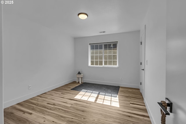 2646 N Lambert St, Cornelius, OR 97113 - spare room featuring wood finished floors and baseboards
