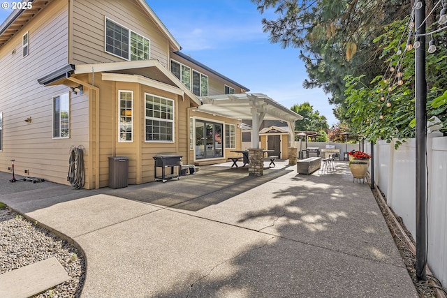 2646 N Lambert St, Cornelius, OR 97113 - rear view of house featuring a patio, a pergola, a fenced backyard, and outdoor dining space