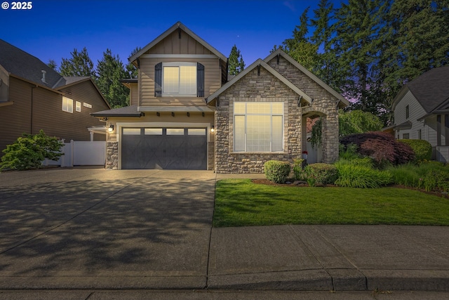 2646 N Lambert St, Cornelius, OR 97113 - view of front of house featuring stone siding, board and batten siding, driveway, and a garage