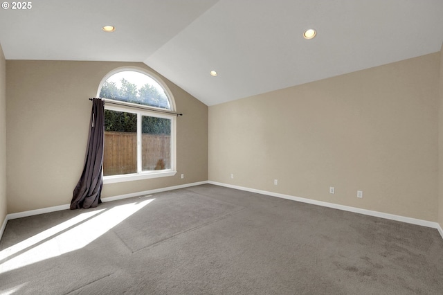 carpeted empty room featuring recessed lighting, baseboards, and lofted ceiling