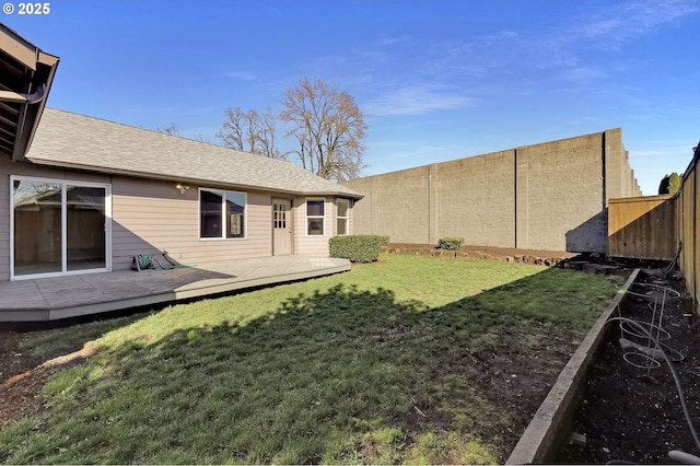view of yard featuring a deck and a fenced backyard