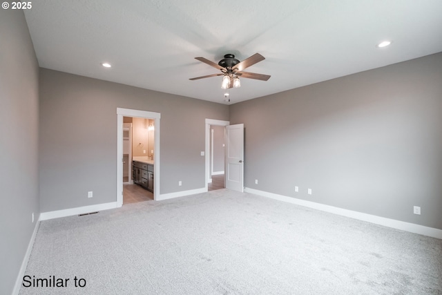 342 NE Cedar St, Sublimity, OR 97385 - unfurnished bedroom with light colored carpet, baseboards, recessed lighting, ensuite bathroom, and a ceiling fan