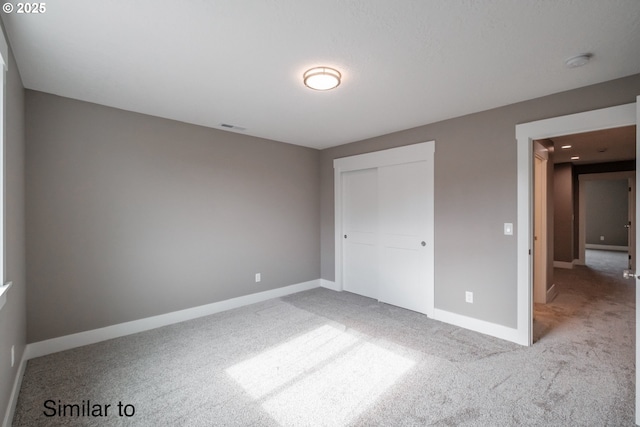 342 NE Cedar St, Sublimity, OR 97385 - unfurnished bedroom featuring carpet, baseboards, and a closet