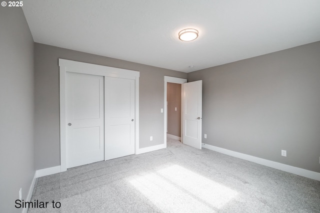 342 NE Cedar St, Sublimity, OR 97385 - unfurnished bedroom featuring carpet, baseboards, and a closet