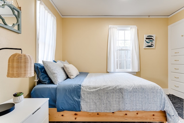 bedroom featuring ornamental molding