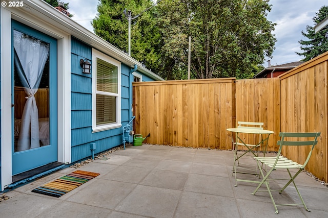 view of patio with fence