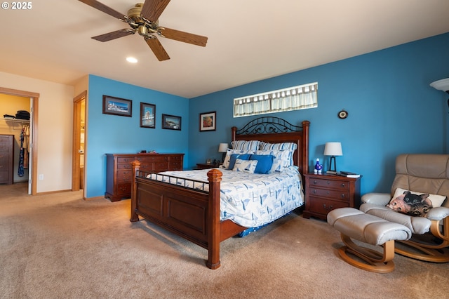 153 Sandwedge Ct, Chehalis, WA 98532 - bedroom featuring light colored carpet, ceiling fan, baseboards, and a walk in closet