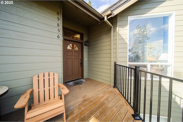 entrance to property with a balcony