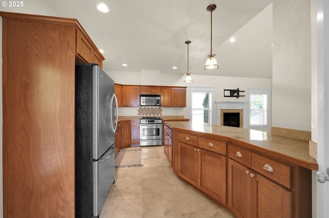 3435 Meadow View Dr, Eugene, OR 97408 - kitchen with stainless steel appliances, brown cabinets, pendant lighting, recessed lighting, and light tile patterned flooring