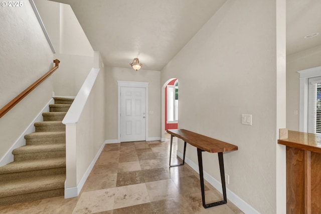 3435 Meadow View Dr, Eugene, OR 97408 - entrance foyer with arched walkways, plenty of natural light, baseboards, and stairs