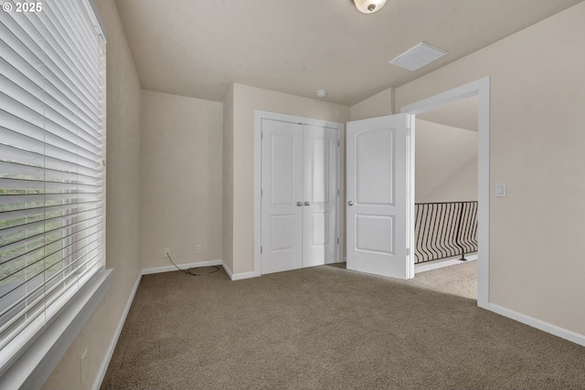 3435 Meadow View Dr, Eugene, OR 97408 - unfurnished bedroom with carpet flooring, baseboards, and a closet