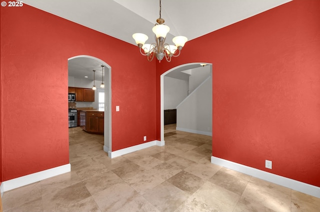 3435 Meadow View Dr, Eugene, OR 97408 - unfurnished room with arched walkways, a chandelier, baseboards, and vaulted ceiling