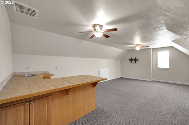 3435 Meadow View Dr, Eugene, OR 97408 - bonus room with a ceiling fan, vaulted ceiling, wet bar, carpet, and baseboards