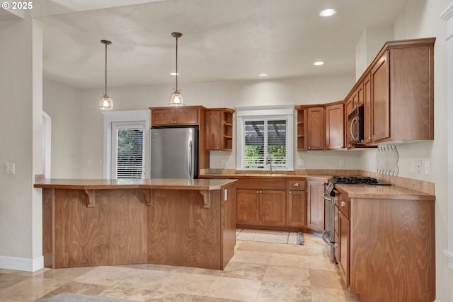 3435 Meadow View Dr, Eugene, OR 97408 - kitchen featuring stainless steel appliances, open shelves, a peninsula, a breakfast bar area, and brown cabinetry