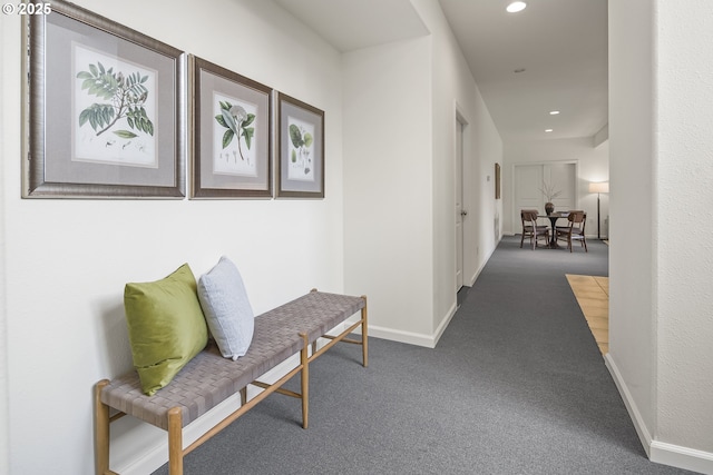 hall with recessed lighting, baseboards, and carpet