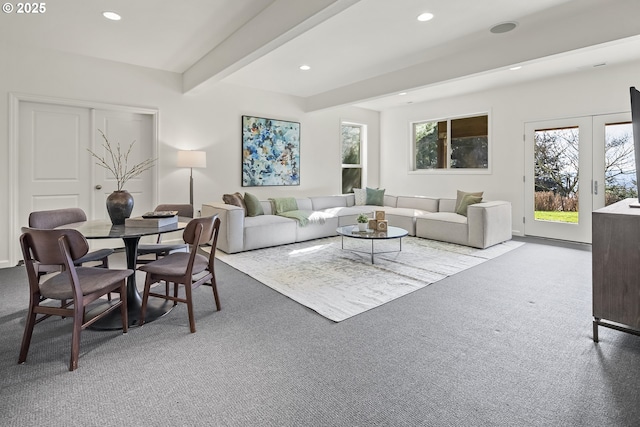 living area with beam ceiling, recessed lighting, and carpet