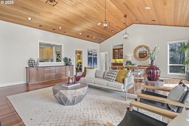 living area featuring recessed lighting, wood finished floors, high vaulted ceiling, and wooden ceiling