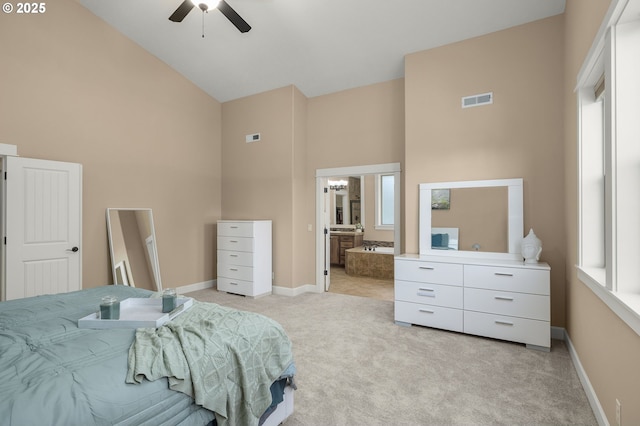 14746 SW 148th Ter, Tigard, OR 97224 - bedroom featuring high vaulted ceiling, light colored carpet, ensuite bathroom, and ceiling fan