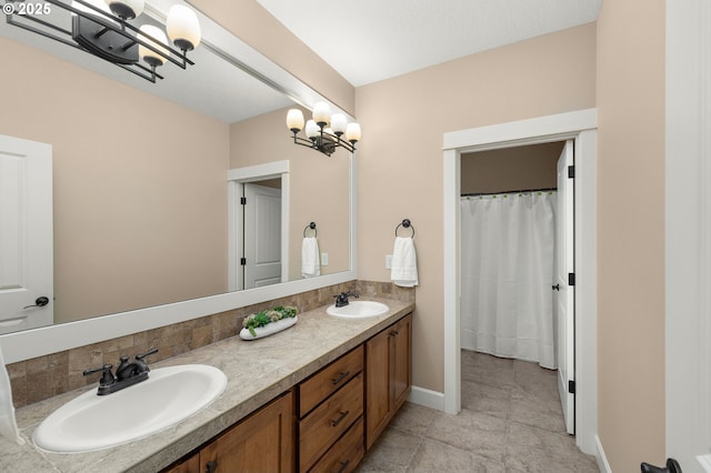 14746 SW 148th Ter, Tigard, OR 97224 - bathroom with double vanity and a chandelier