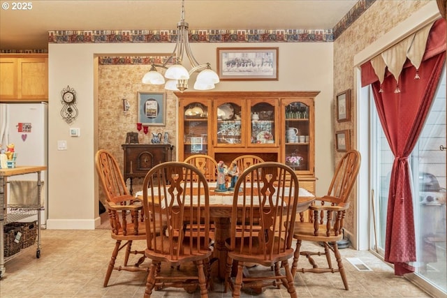 1703 Webb Lake Dr, Silverton, OR 97381 - dining area with baseboards and visible vents