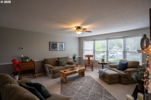 2580 Elysium Ave, Eugene, OR 97401 - living room with carpet floors, ceiling fan, a textured ceiling, and baseboards