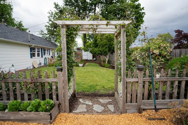 2580 Elysium Ave, Eugene, OR 97401 - view of yard with a vegetable garden and a pergola